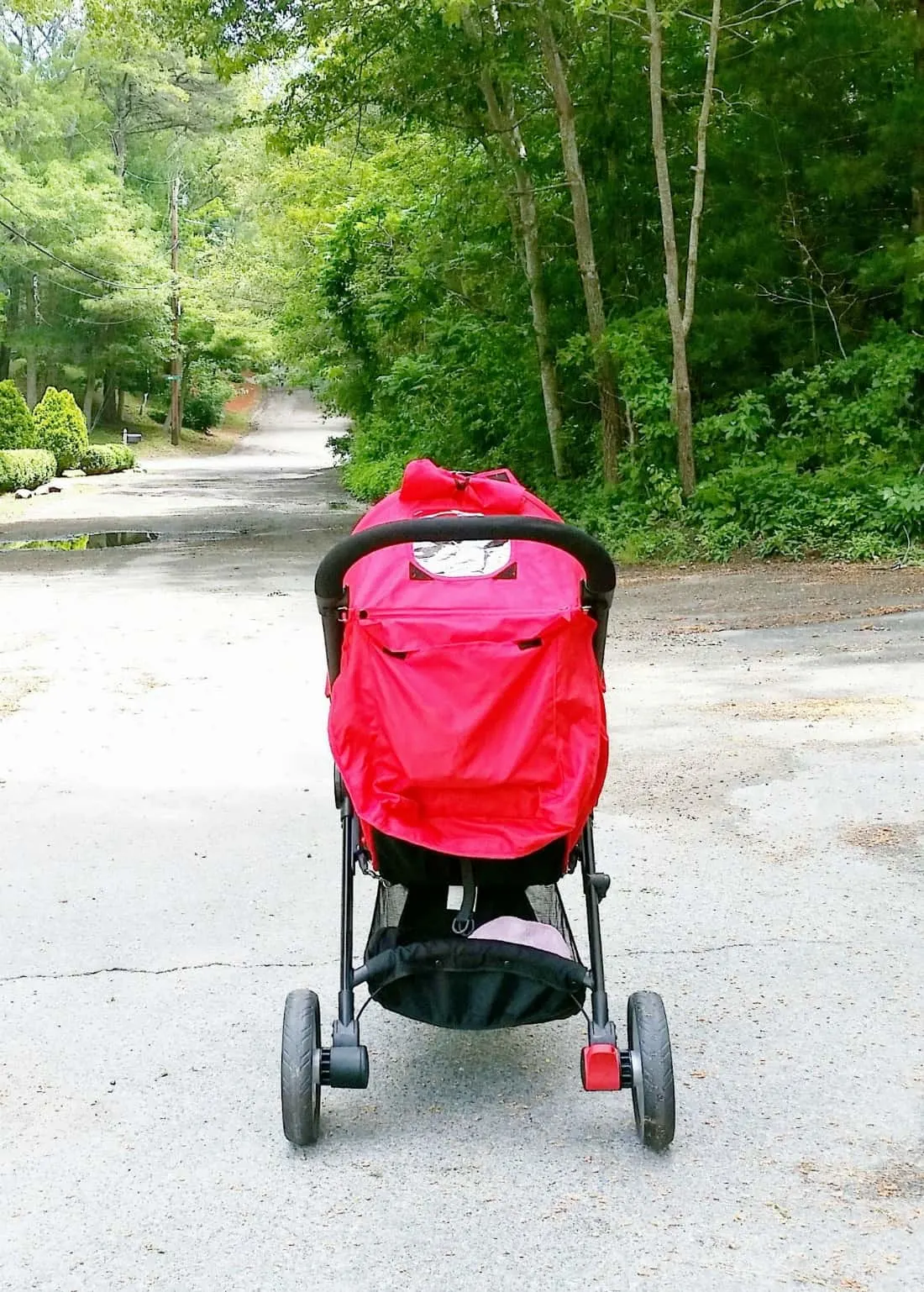 Baby Jogger Cite Lite stroller on paved path.