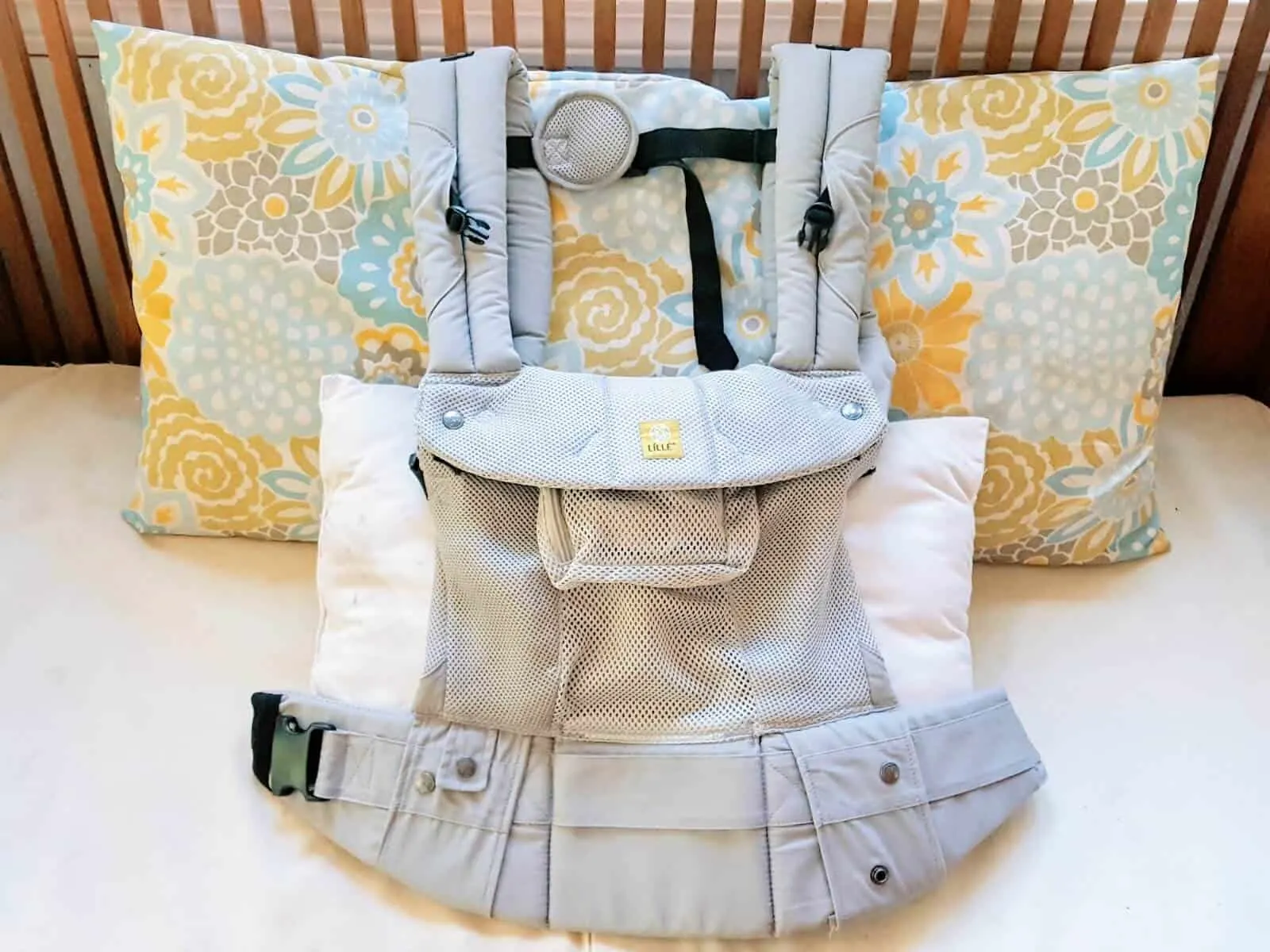 Grey babywearing carrier.