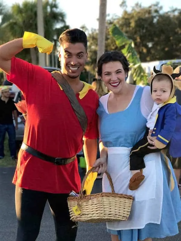 Family wears Beauty and the Beast costume for Halloween.