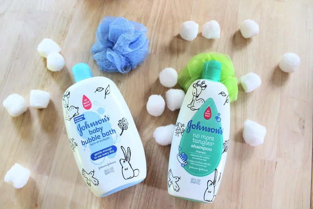 Johnson\'s baby products surrounded by cotton balls.