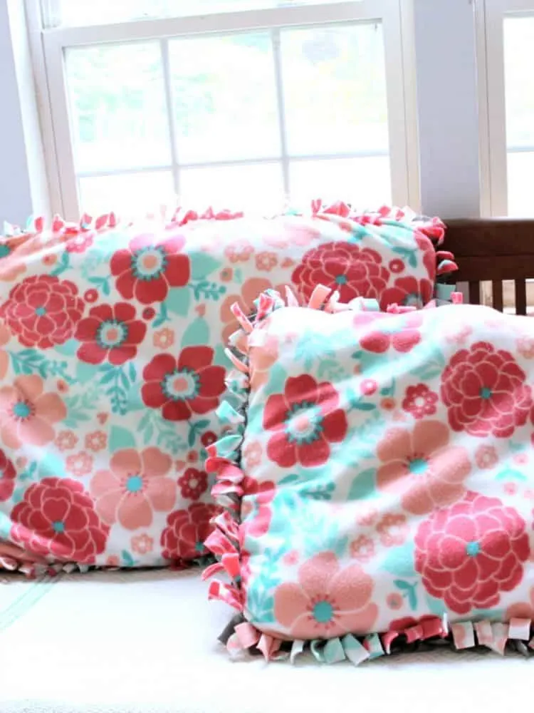 DIY Dog Bed & Baby Pillow sit on table.