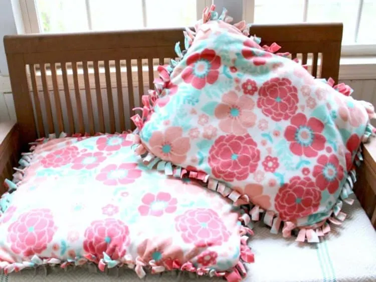Pillows sit on table.