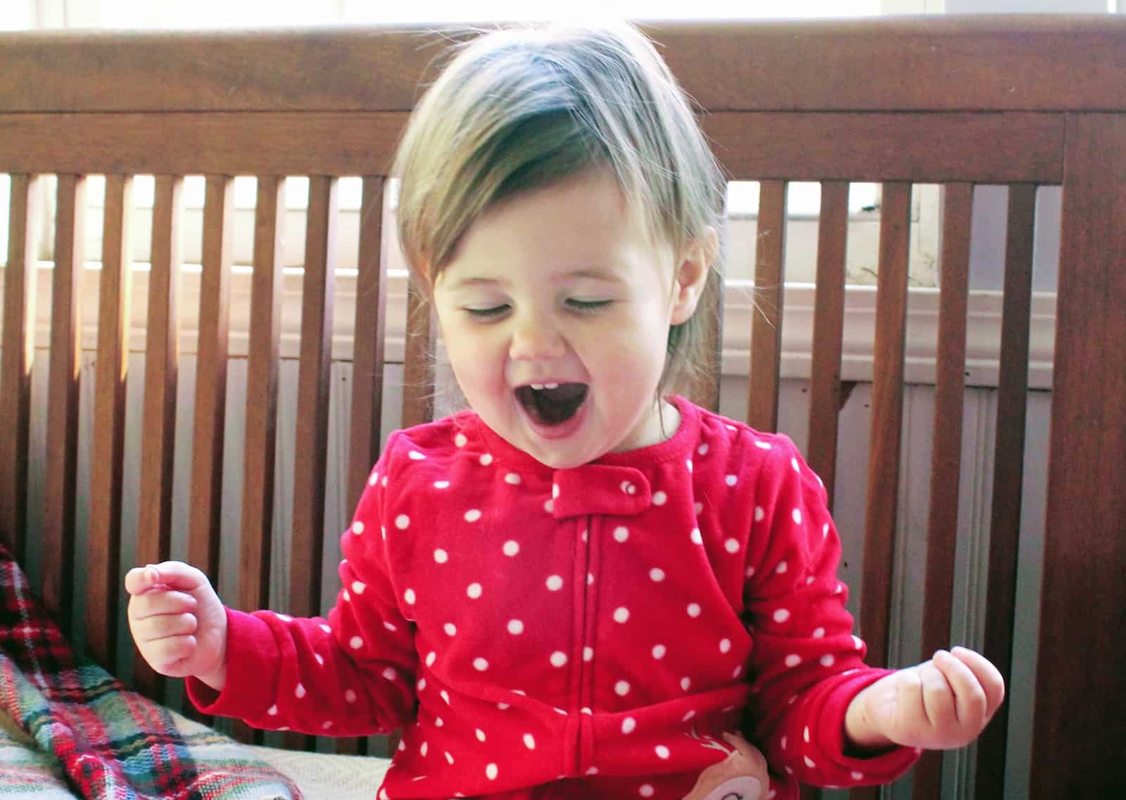 Excited toddler girl during the holiday season.