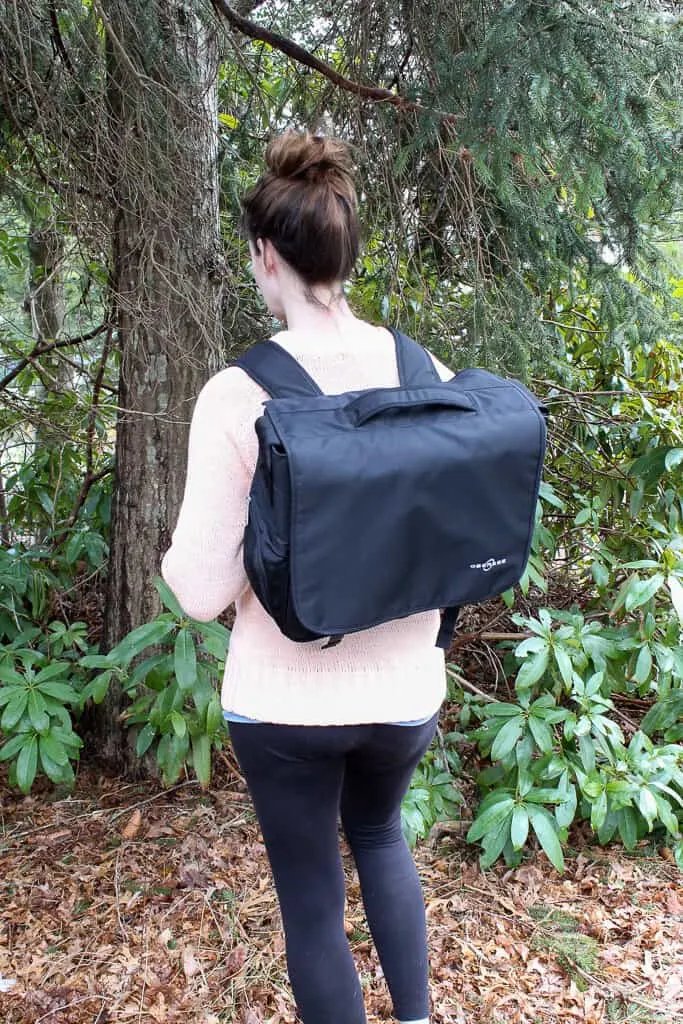 Woman wears convertible bag on walk.