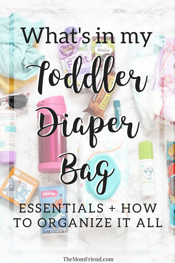 Pinterest graphic with text and image of diaper bag items.