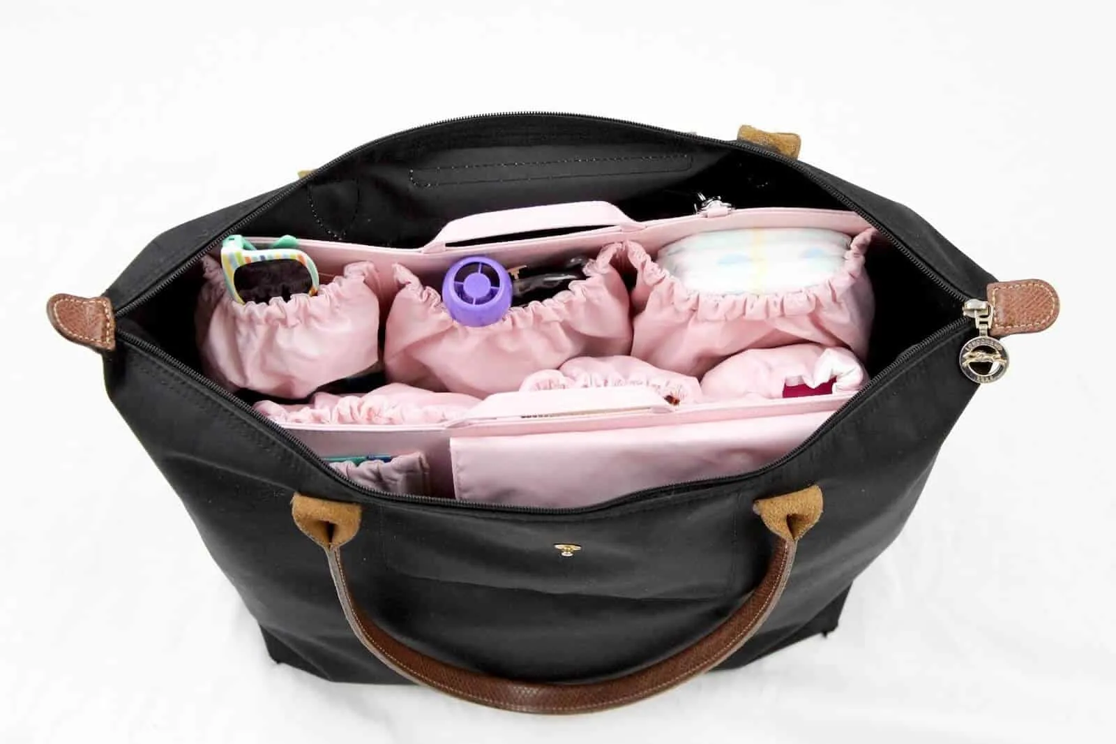 Diaper bag organization for toddler items.