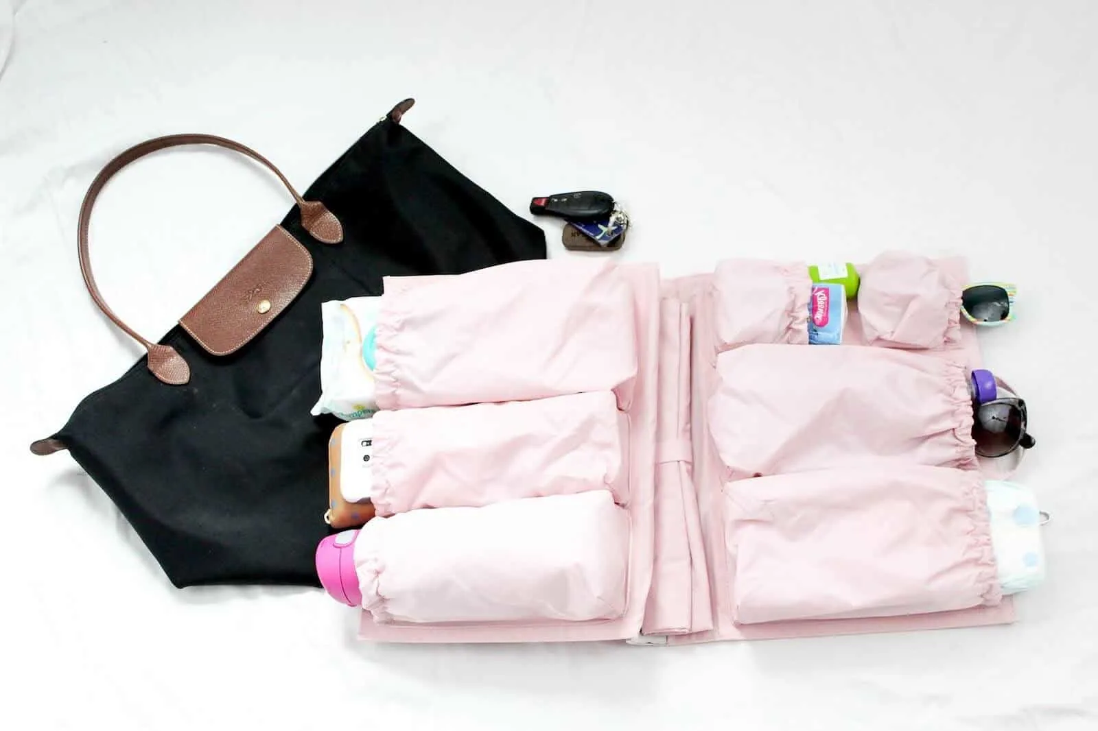 Toddler diaper bag with toddler care items.