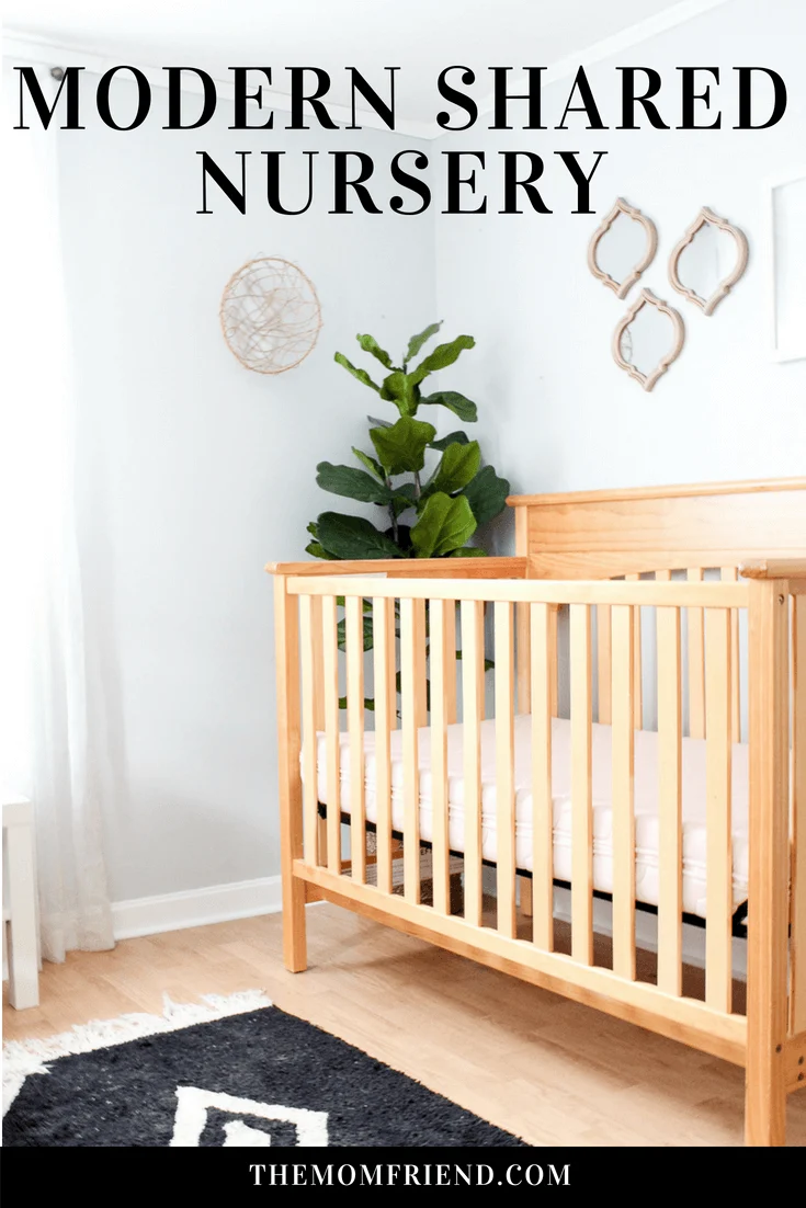 Pinterest graphic with text and crib in modern girl nursery.