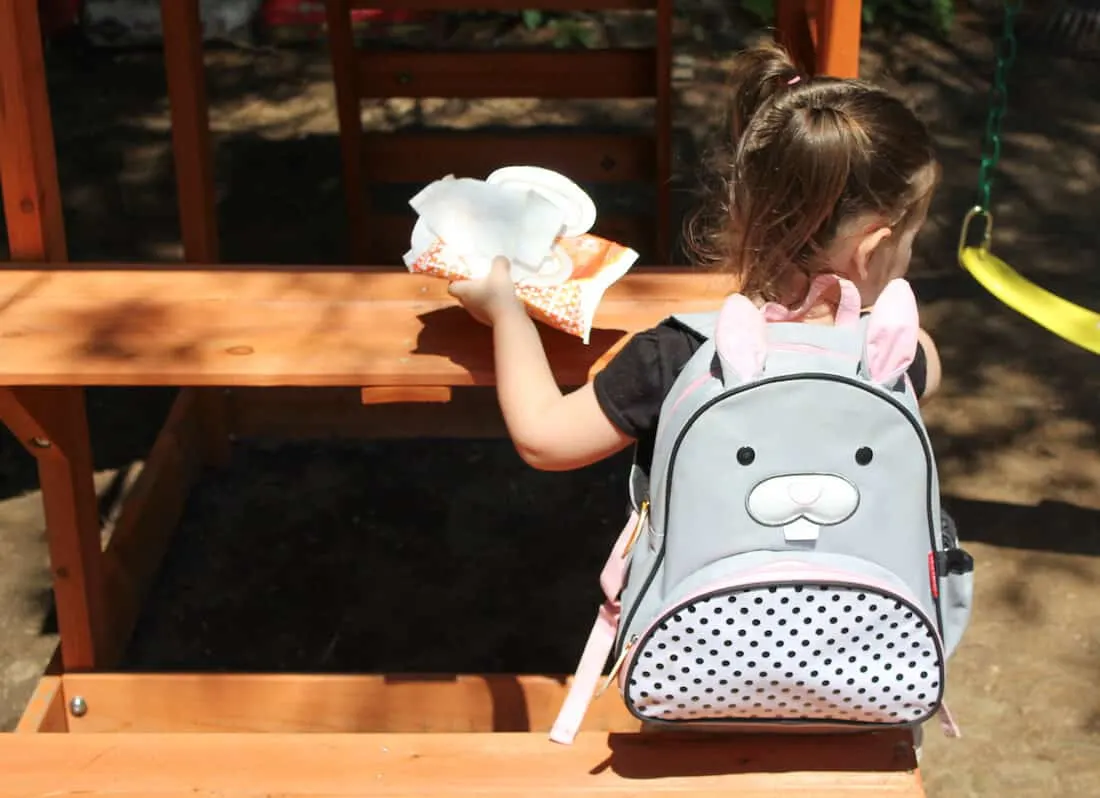 Girl wears bunny backpack for preschool.