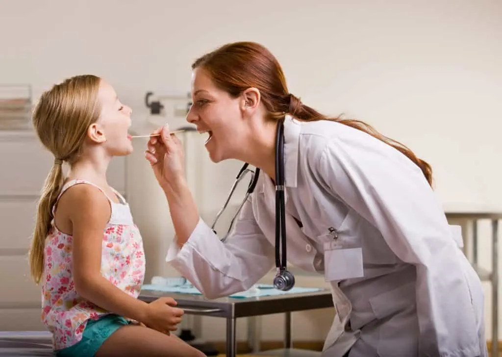 Pediatrician with a girl patient.