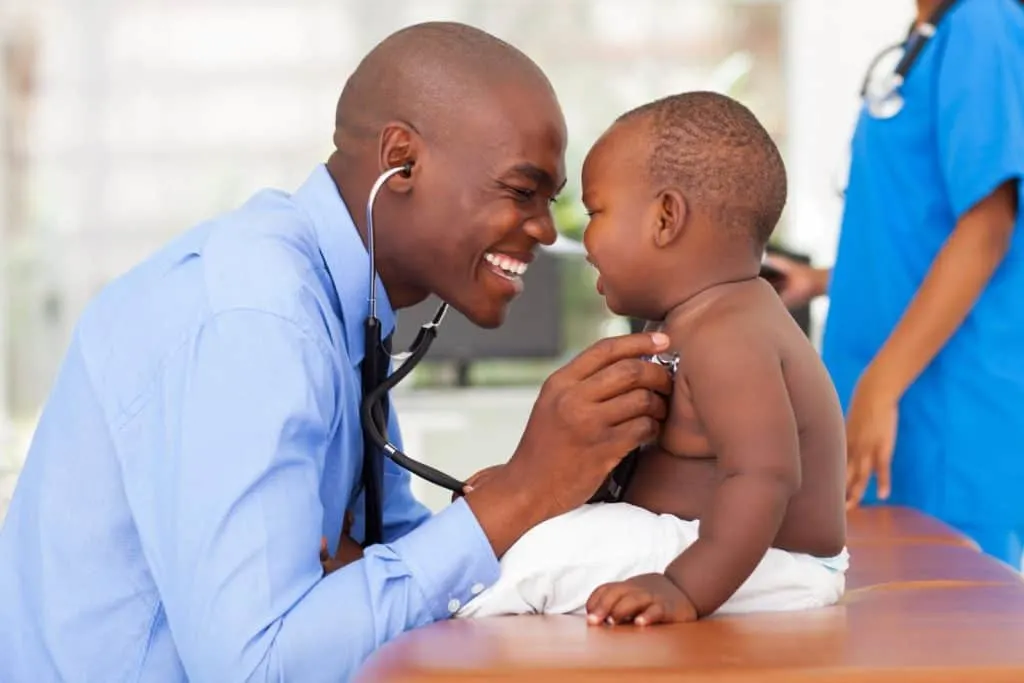 Pediatrician with baby.