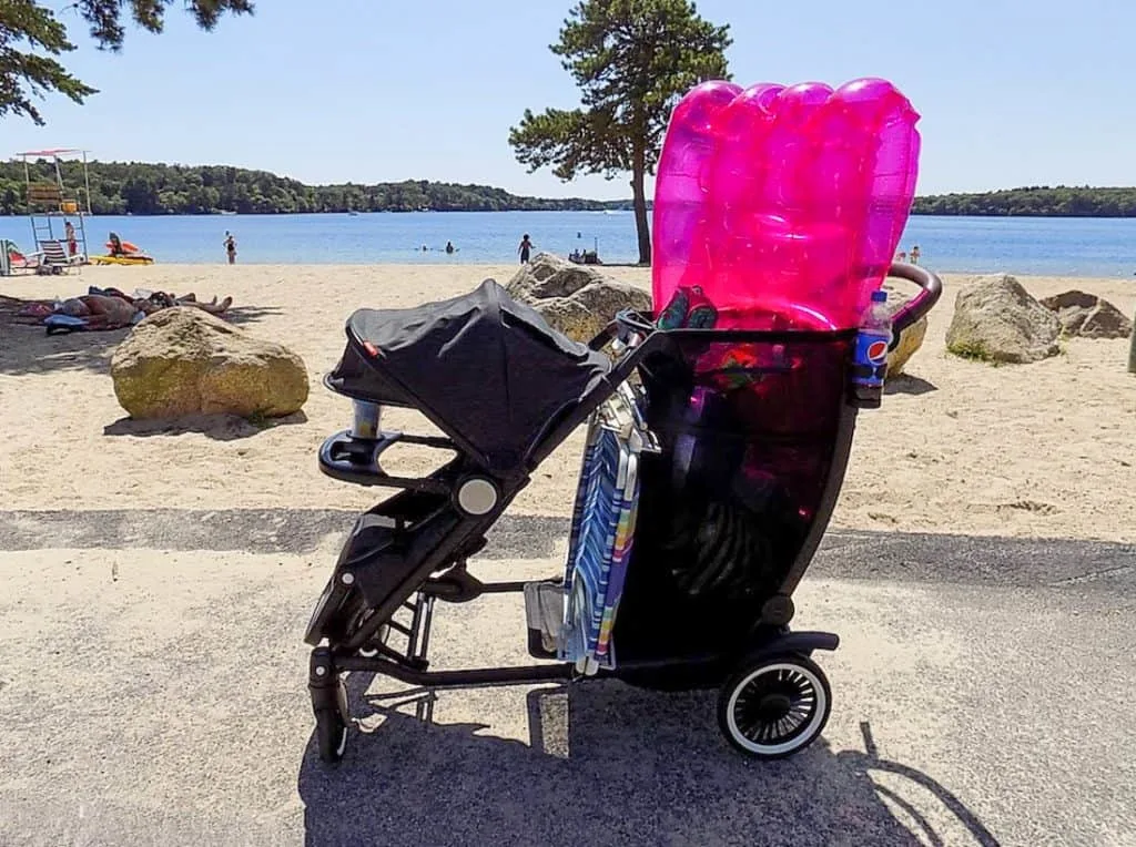 Stroller carries beach supplies to beach.