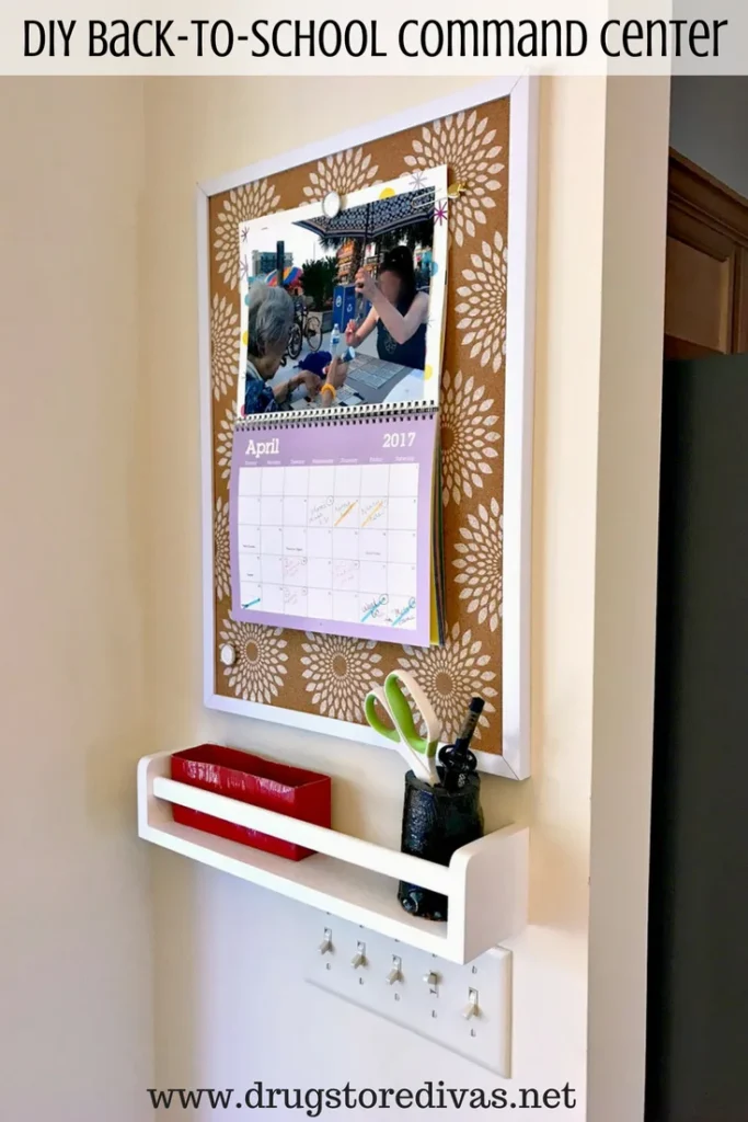 DIY command center with a calendar and wood shelf.