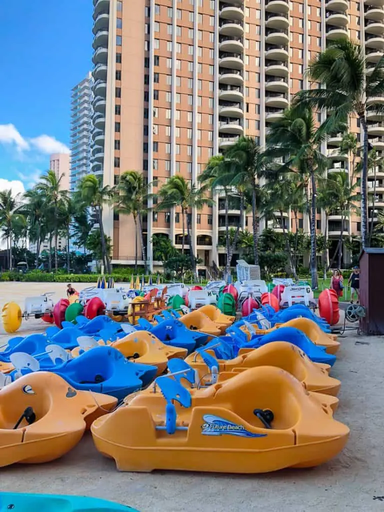 Paddle boats on Oahu beach.