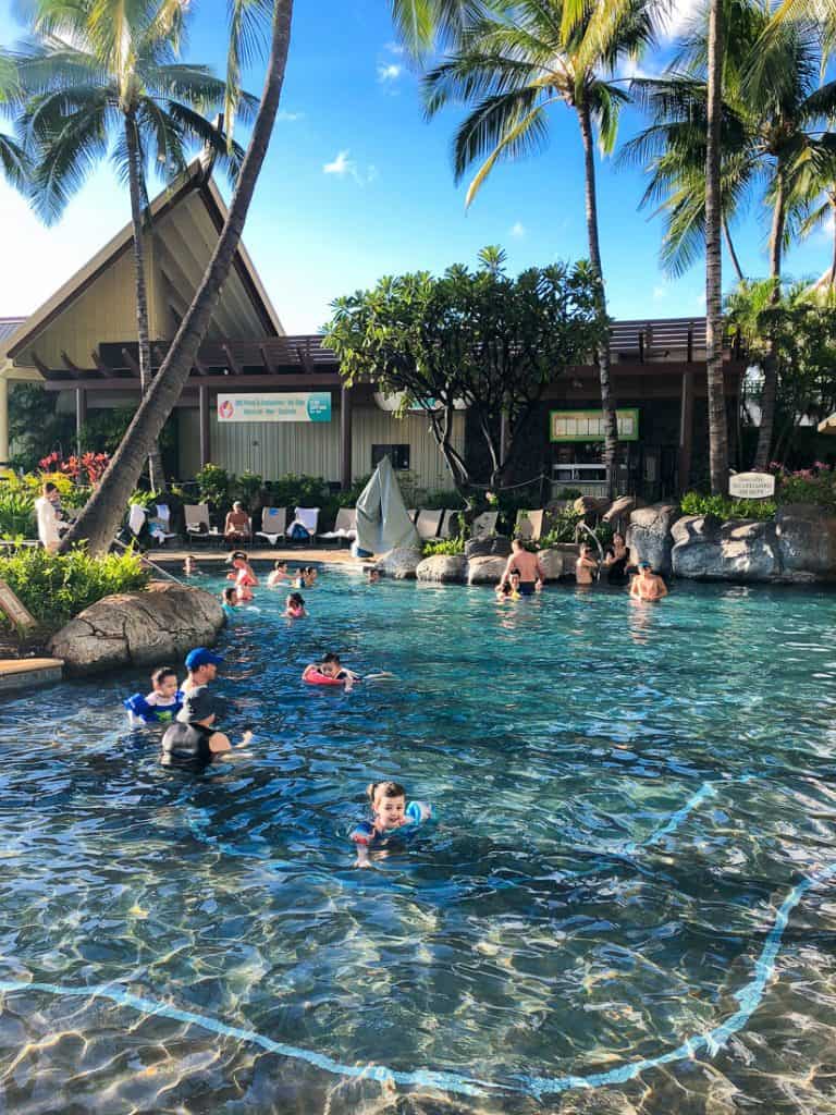people swim in pool in Oahu.