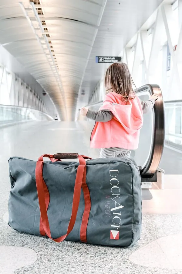 travel with a dockatot transport bag in airport