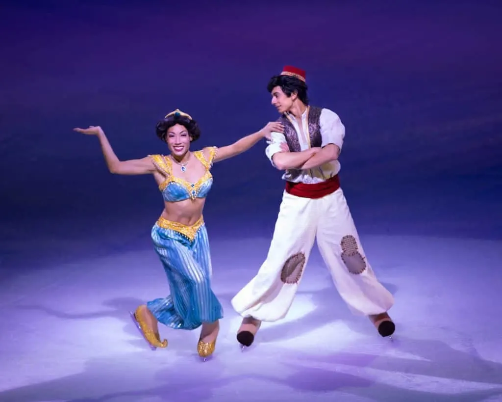 Aladdin Disney character ice skaters perform.