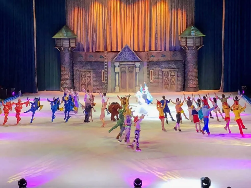 Disney performers skate to music.