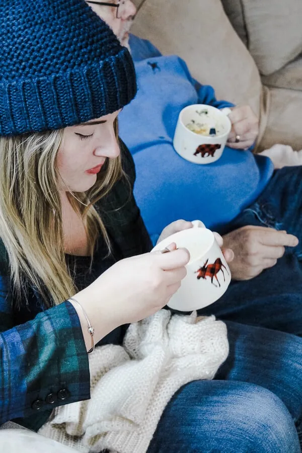 Women eat soup at cozy soup party.