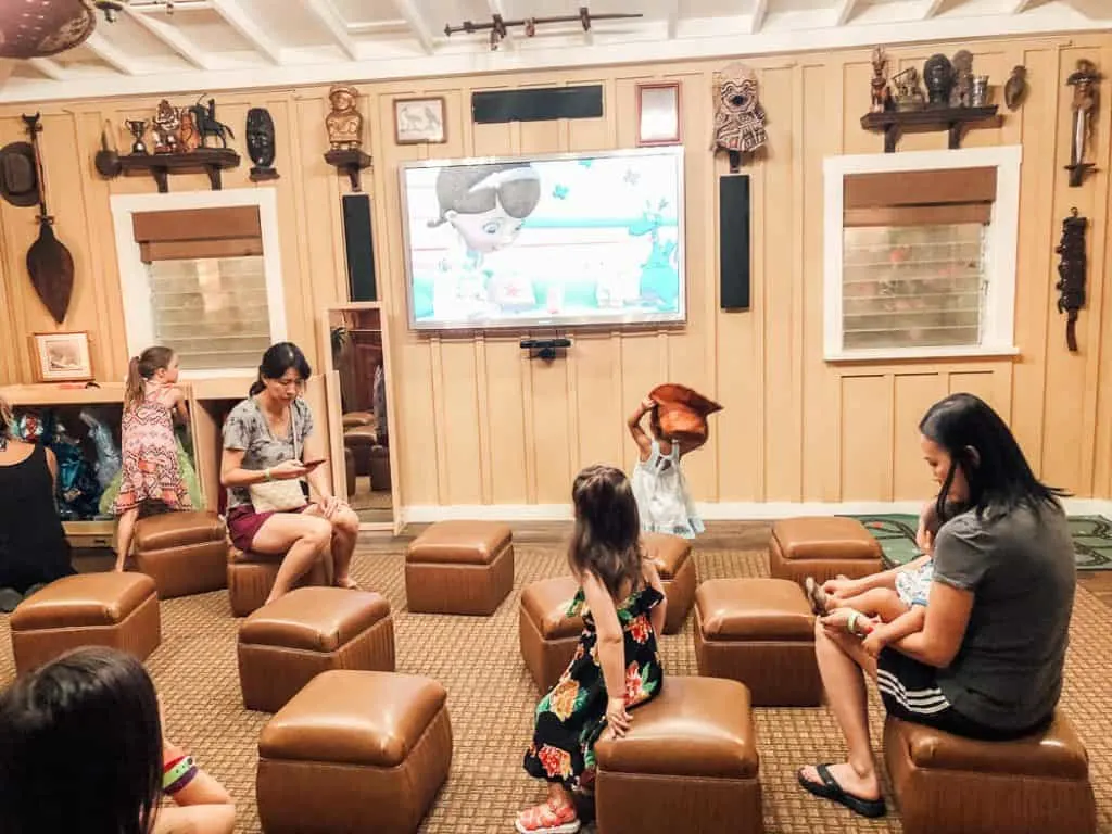 Children watch TV show at resort for Disney.
