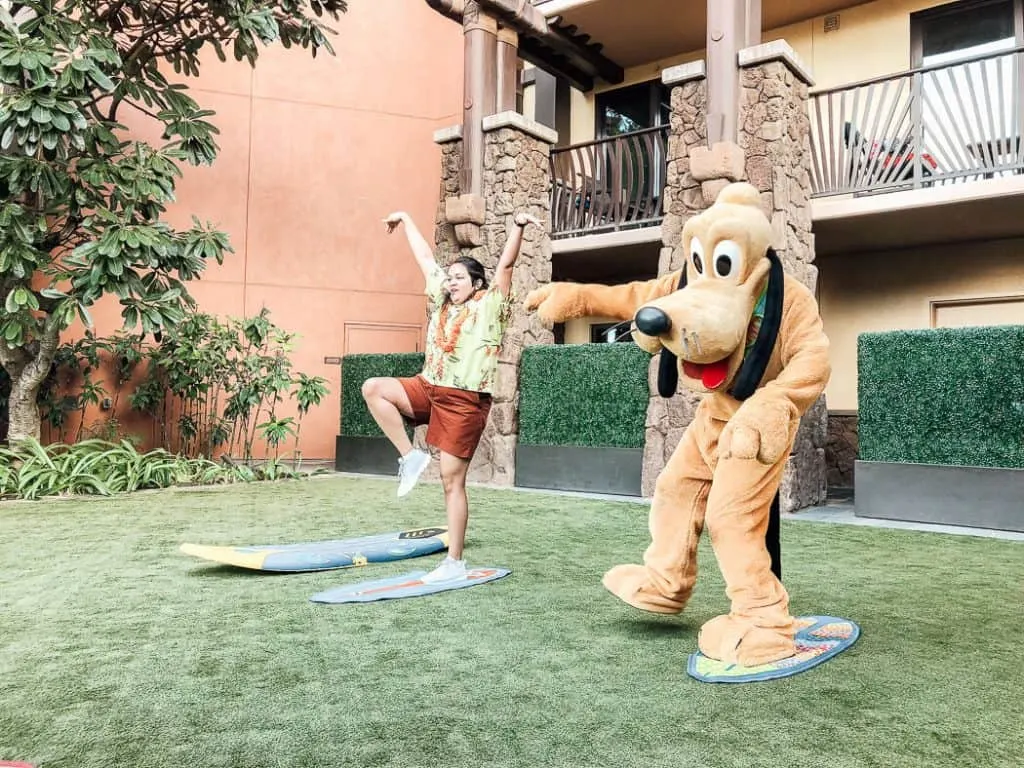 Instructor leads activity with Disney character at Aulani resort.