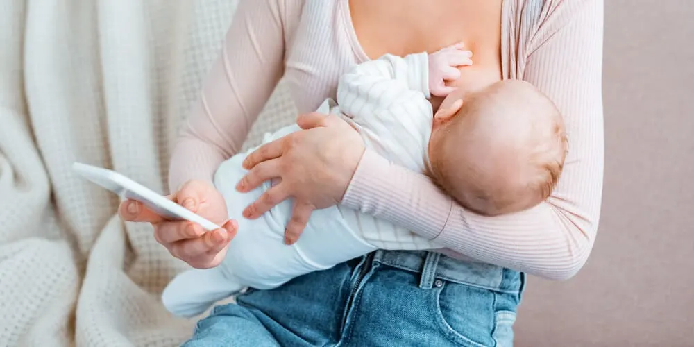 mother breastfeeding her baby