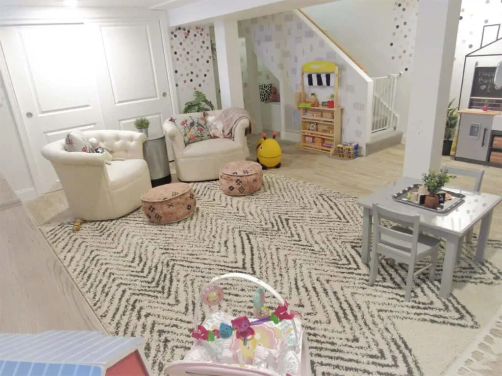 neutral playroom with chairs and kids table