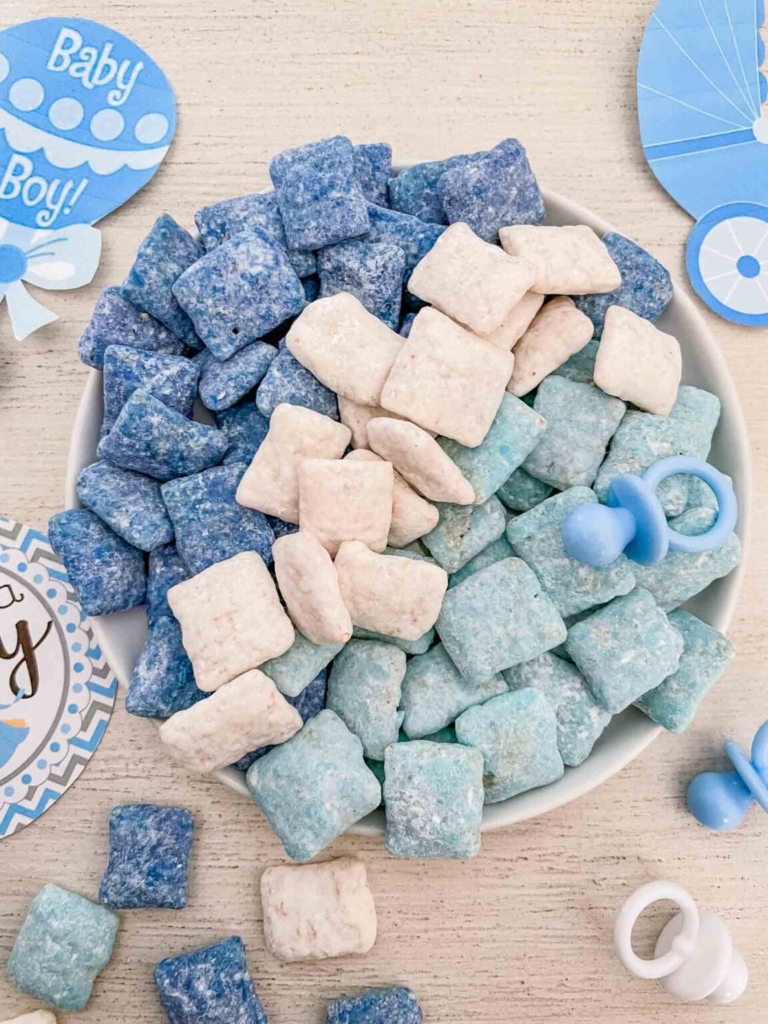 Blue and white gender reveal puppy chow party snack.