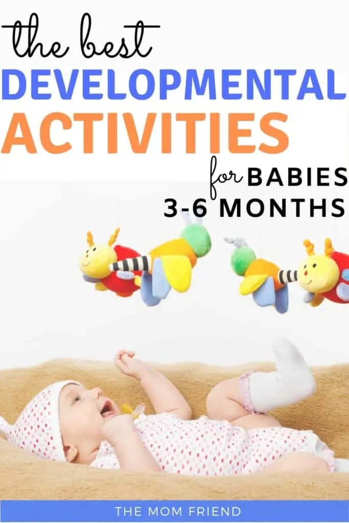baby playing with toy hanging above it with text the best developmental activities for babies 3-6 months