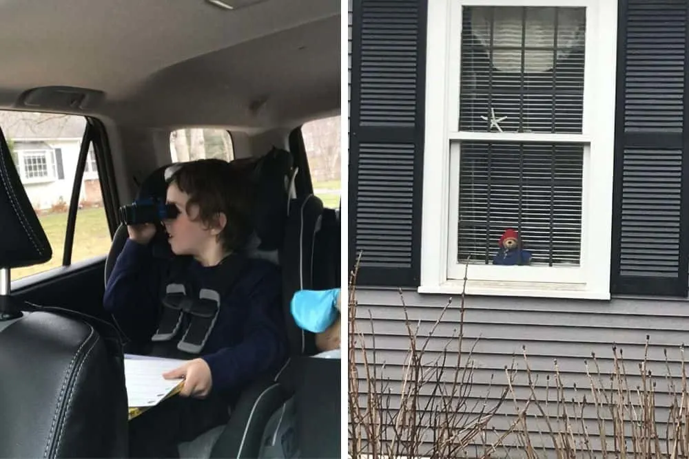 Child participates in neighborhood bear hunt with binoculars. 