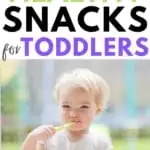 toddler girl eating a healthy snack