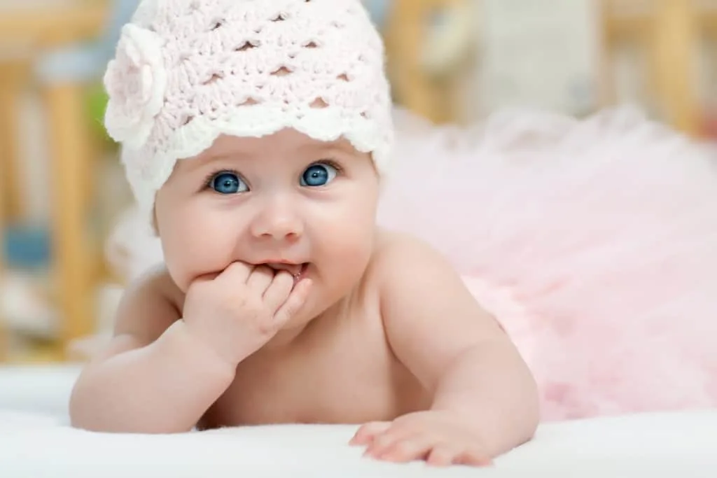 Baby girl in pink tutu.