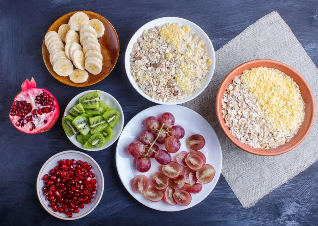 healthy snacks for toddlers spread out including fruit and oatmeal