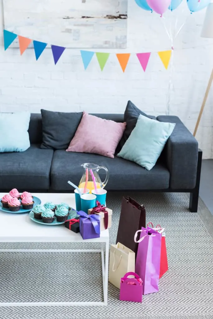 Living room decorated for gender reveal party.