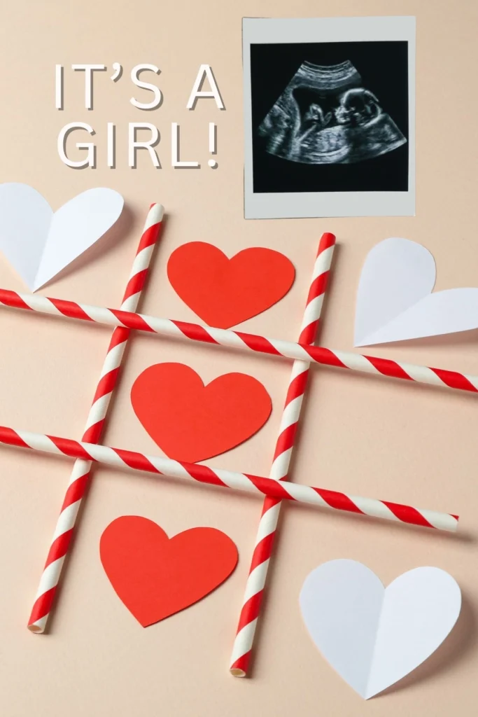 A tic tac toe game with hearts next to an ultrasound and text that says "It's a girl!"