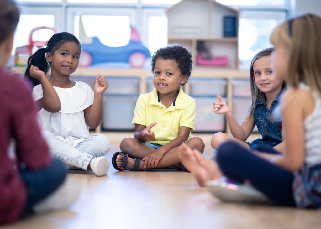 Children play a game at preschool.