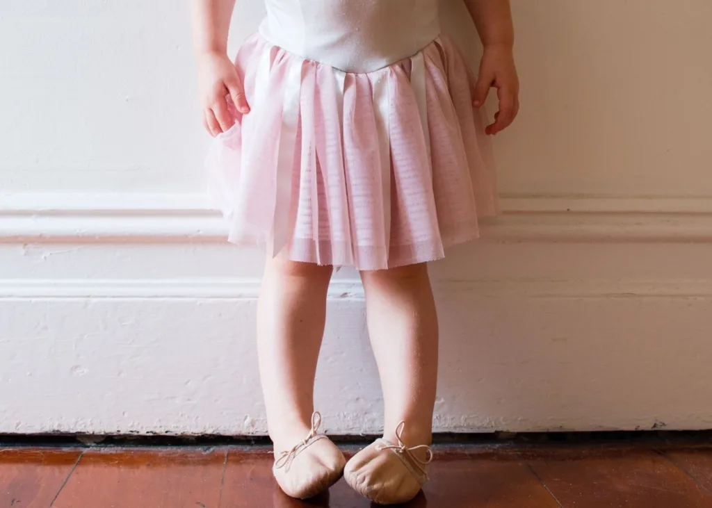 Baby girl ballerina in a tutu.