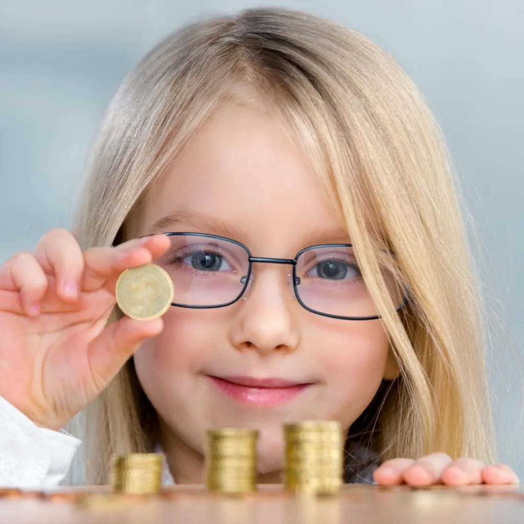 Girl counting coins.