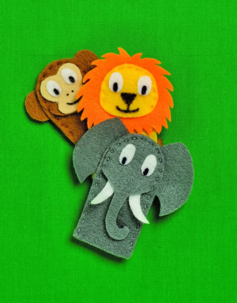 Felt circus animal finger puppets, including an elephant, lion, and monkey.