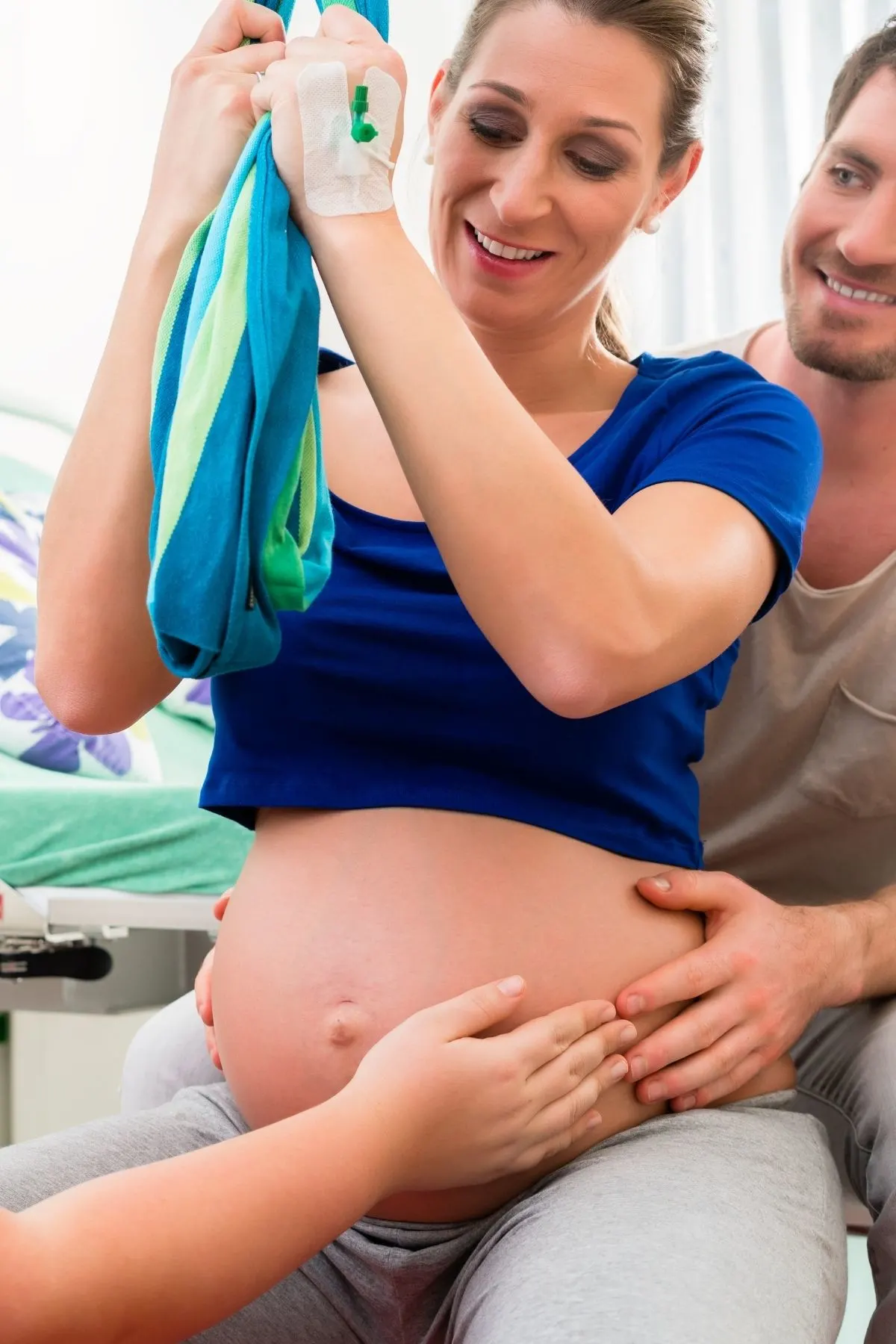 The BEST Baby Shower Game Ever! Husband gets to experience labor  contractions with TENS machine 