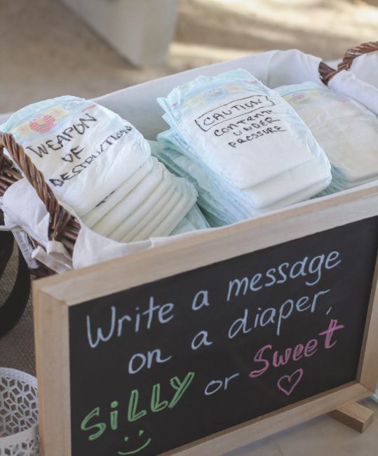 Box or diapers with written messages on them