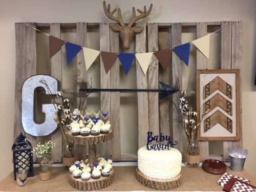 Baby shower dessert table with wooden tones