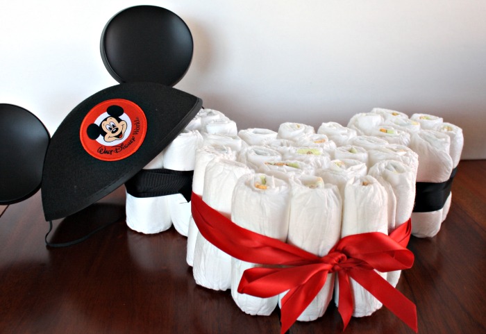 Mickey Mouse baby shower diaper cake with a Disney Mickey hat.