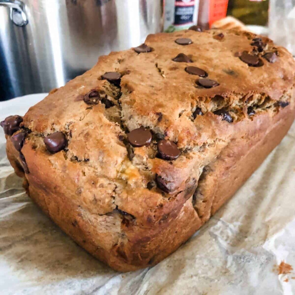 Lactation banana bread with chocolate chips on parchment paper.