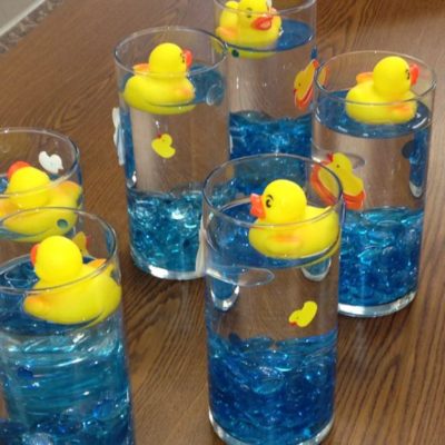 Rubber ducks in glasses for decoration