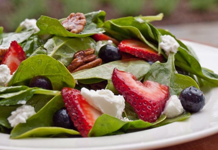 Spinach, berry, feta, and pecan salad